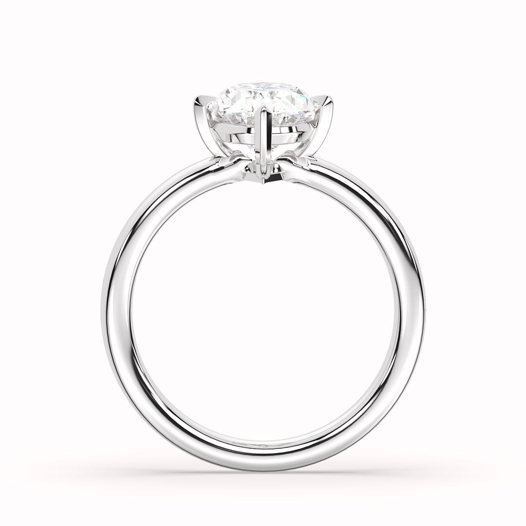Round Cut Low Profile Halo Engagement Ring In 18K White Gold | Fascinating  Diamonds